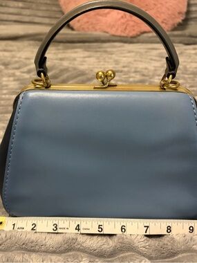 Coach 1941 kisslock frame bag.